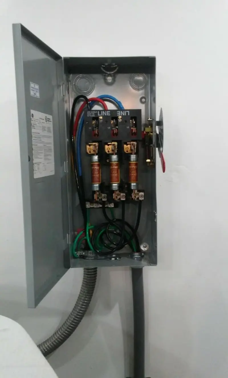 Three-phase disconnect switch installed for Smoke Detector Installation in Amelia